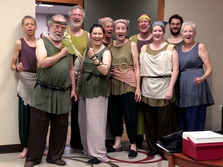 Ten Coriolanus cast members getting a group shot outside the dressing rooms.